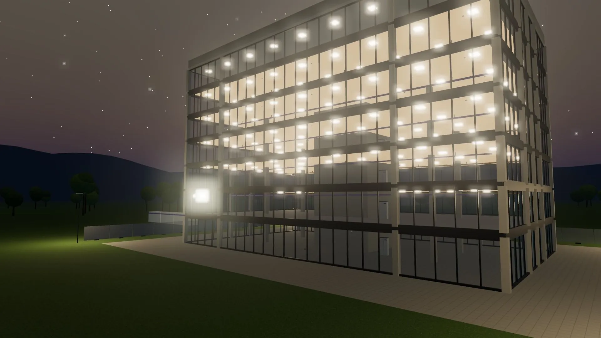 Immeuble de bureaux éclairé à la tombée de la nuit